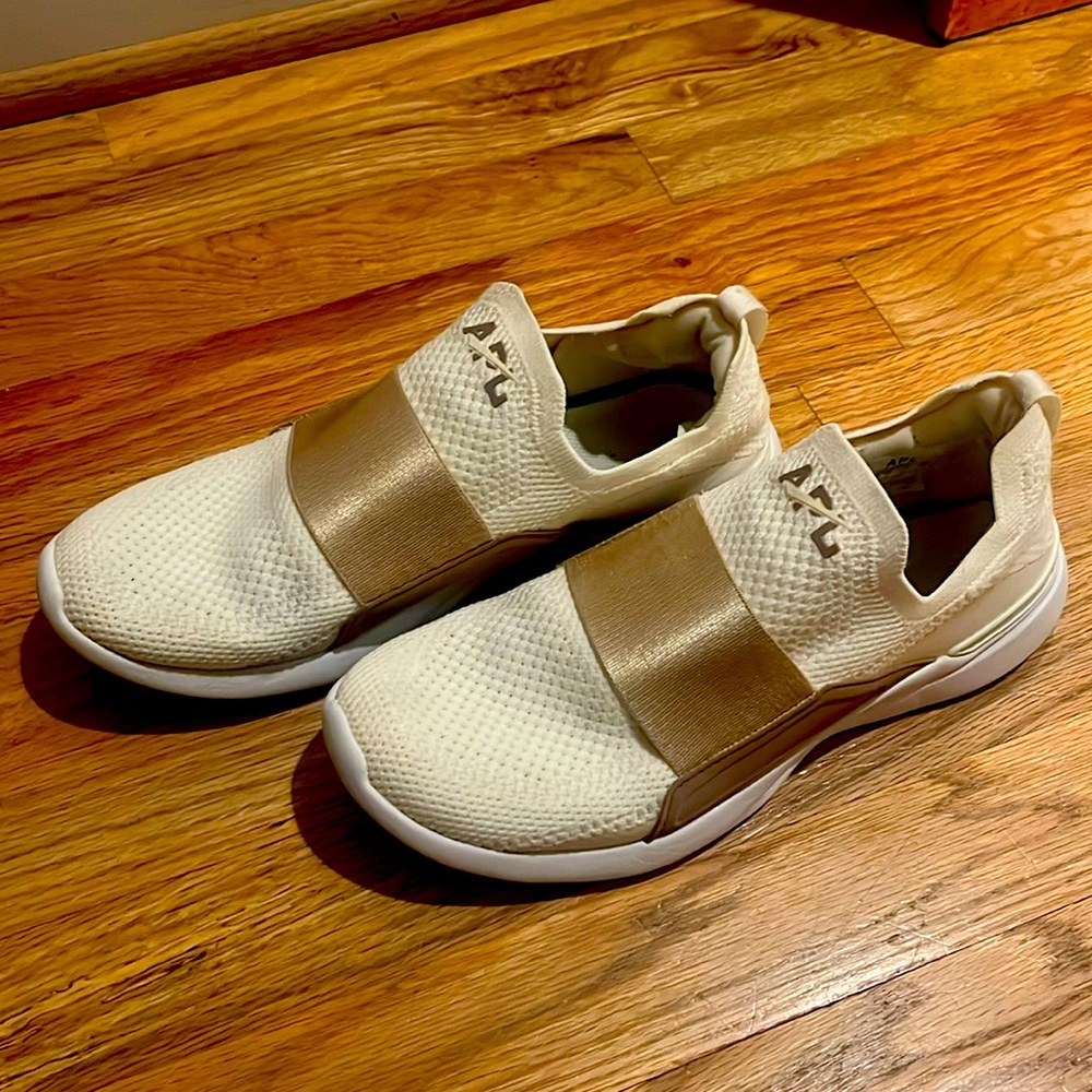 APL Gold and Cream Athletic Shoes with Slip-On Design